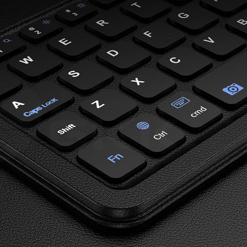 Close-up of a black keyboard with visible keys on a dark background