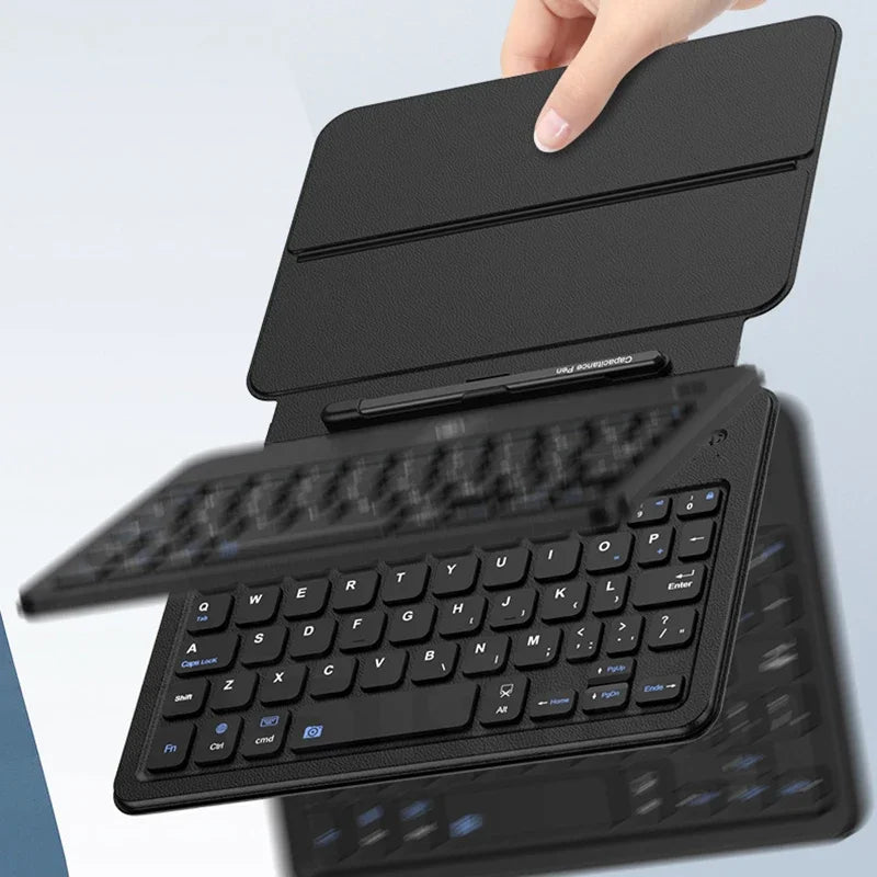 Black keyboard case with detachable keyboard held by a hand on a light blue background